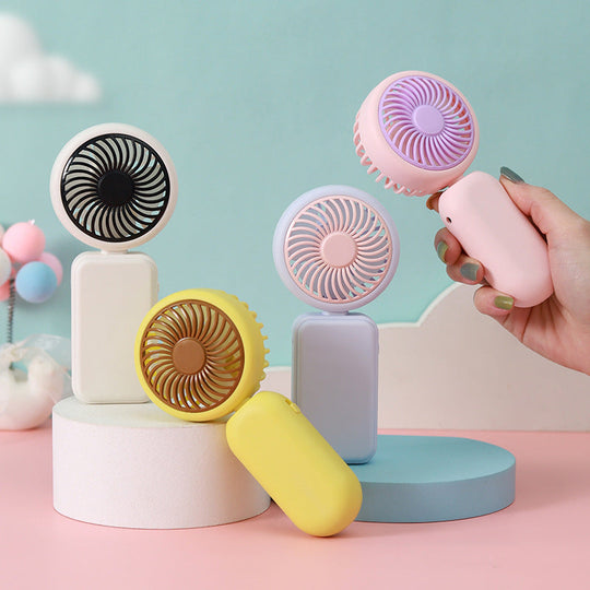 Ventilator de mână portabil pentru femei cu design ergonomic 2